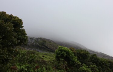 An atmospheric view of Anamudi Peak, the highest point in South India, located in the Western Ghats...