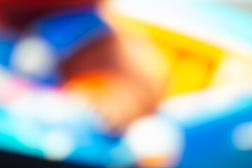 multicolored blurred abstract backdrop. soft blue with light orange bokeh background.