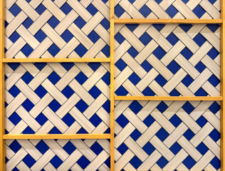 Close up of hand woven rattan texture in natural white beige and blue colors. Wicker and rattan art...