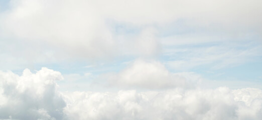 blue white clouds on the soft sky background in the morning, View of white clouds from the foot of the mountain