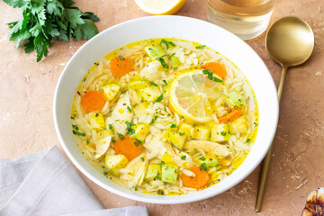Lemon chicken orzo soup. Recipe. Italian food.