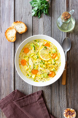 Lemon chicken orzo soup. Recipe. Italian food.