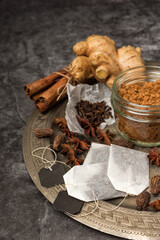 Spices for Indian masala chai tea on a metal try
