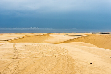 Dunes and lagoons of Atins, Lencois Maranhenses, Barreirinhas, Brazil. White sand dunes with pools of fresh water