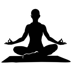 Silhouette of a person meditating in a lotus position on a yoga mat indoors at sunset