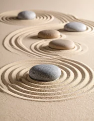 Photo sur Plexiglas A zen garden with raked sand and smooth stones, representing balance, tranquility, and mindful movement.