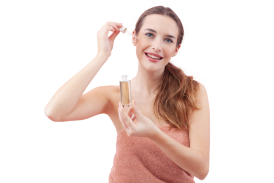 Smiling woman applies serum to her face using a dropper. Radiating sense of relaxation and self care. Isolated white Background emphasizes the clean and fresh feeling associated with skincare routines