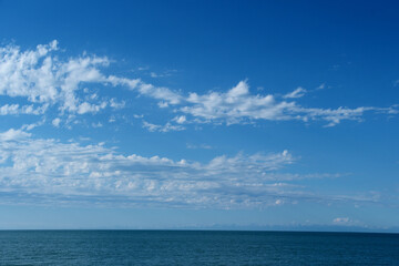 blue sky with cloud closeup and sea background. Nature composition.  Beautiful seascape background.