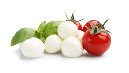 Tasty mozzarella cheese balls, tomatoes and basil isolated on white