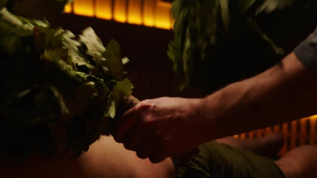 Steaming And Massaging Body By Oak Brooms, Close Up View In Sauna, Anti-Stress And Skincare