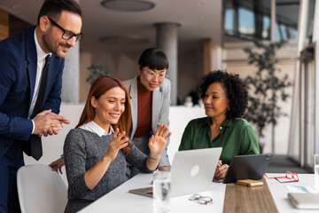 Diverse Team Collaborating During a Successful Office Meeting Discussion