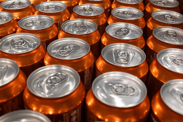 Rows of Orange Soda Cans