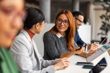 Business Team Collaborating During an Office Meeting with Professional Engagement