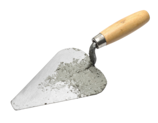 A masonry trowel with a wooden handle partially covered in wet cement.