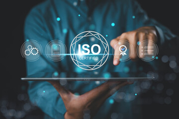 ISO certification and quality assurance, Businessman using laptop computer with quality assurance...