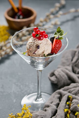 Vegan berry ice cream in elegant glass, natural lighting, muted color palette, minimalistic composition
