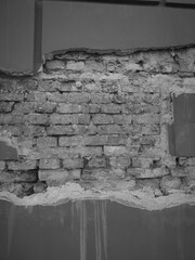 Black and White Photo of the Old Brick Wall With Decay Background 