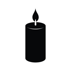 burning candle on black background