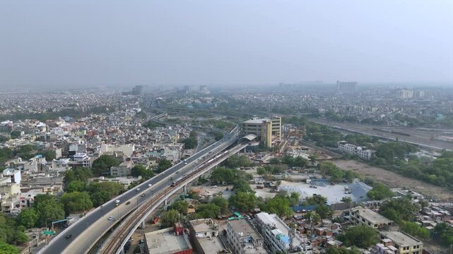 An Aerial Shot of Delhi Metro at Tughlakabad Delhi Metro Station in NCR, India
