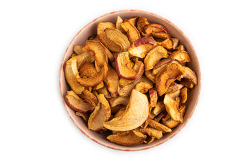 Dried Apples in ceramic bowl isolated on white. Top view, close up