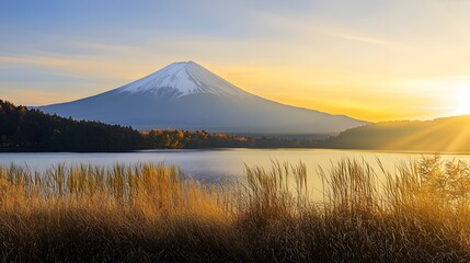 Obraz premium Towering mountain peak standing majestically against a clear blue sky in a natural landscape