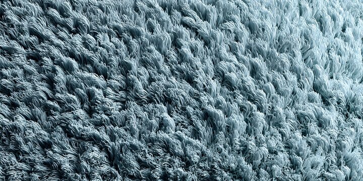 Close-up shot of a textured carpet with light blue fluffy pile surface - Powered by Adobe