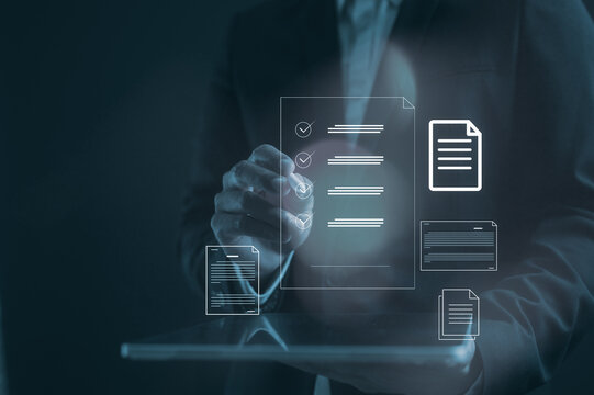 Businessman use pen and digital tablet working with Document data system Report HR technology Concept Businessman Manager checking white documents reports papers of files icon in modern office