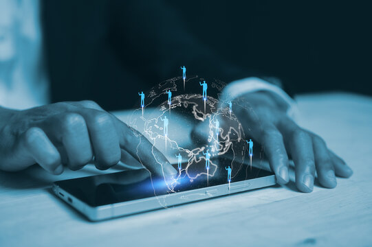 Businessman using mobile smartphone working on Global network connection. Big data analytics and business intelligence concept. World map point and line composition concept of global business