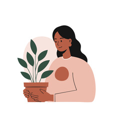 Young woman with long dark hair in a peaceful mood holding a potted plant against a peach circle background with copy space