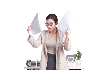 Asian businesswoman posing next to desk full of documents