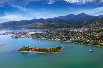 Nelson, New Zealand. Aerial view of harbour, city, suburbs, port, hills, with Haulashore Island,...