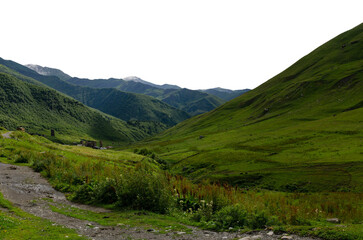 Scenic green mountain valley landscape with historic towers, dirt path, and summer hills in sunlight transparent background