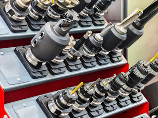 Precision tools displayed in organized storage for machining at industrial workshop