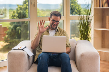 Young home-based online therapist in virtual counseling session, focused mental health professional...