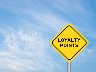 Yellow transportation sign with word loyalty points on blue color sky background