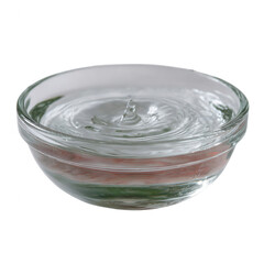 A clear glass bowl filled with water, showcasing the rippling surface created by a droplet. Ideal for showcasing reflections and fluid motion.