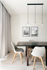 Modern dining area with elegant decor and minimalist furniture design