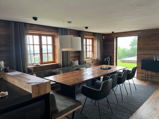 Modern Rustic Dining Room with Natural Light and Elegant Decor