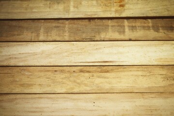 Naklejka premium Brown wood board background or texture