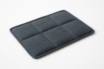 Gray weighted blanket resting on white background
