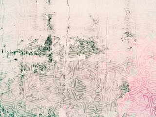 abstract distressed canvas wallpaper.Arabic calligraphy wallpaper on the wall Gradient Shiny different colors background old canvas painting on canvas translation "interlacing Arabic letters