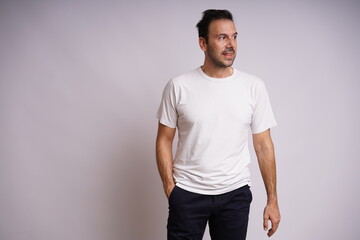 Obraz premium Male Model Showing Different Emotions on White Studio Background