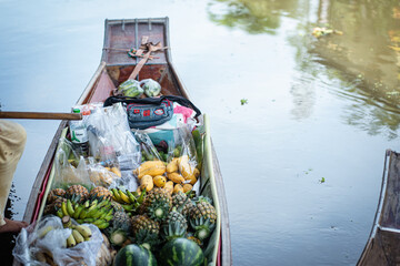 Traditional food and drink with local fruit sell on boat in floating market sightseeing travel