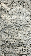The texture of the rocks with natural cracks depicts solidity.