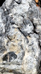 The texture of the rocks with natural cracks depicts solidity.