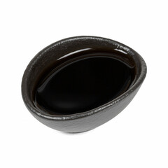 A small black bowl filled with dark soy sauce on white background