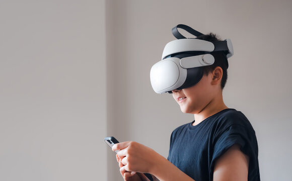 Modern technology concept, Smile happy young boy using mobile smart phone login app game on AR glasses,School kid getting experience while using VR headset glasses learning,Modern technology leisure