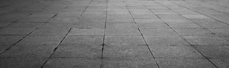 Background, tile floor. Paved stone seamless pattern. Pavement tile texture. Stone mosaic background. Cobble floor exterior pattern. Block sidewalk ornament.  illustration isolated on gray background.