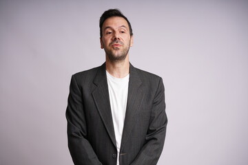 Male Model Showing Different Emotions on White Studio Background