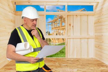 Man builder thought. Specialist construction company scratches chin. Man builder stands under frame...